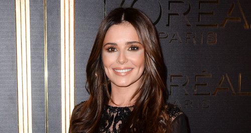 Cheryl looking pregnant